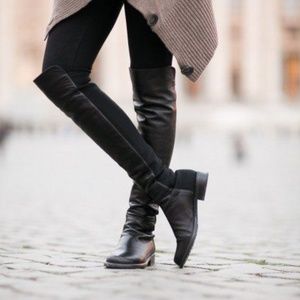 5050 Stuart Weitzman black leather boots